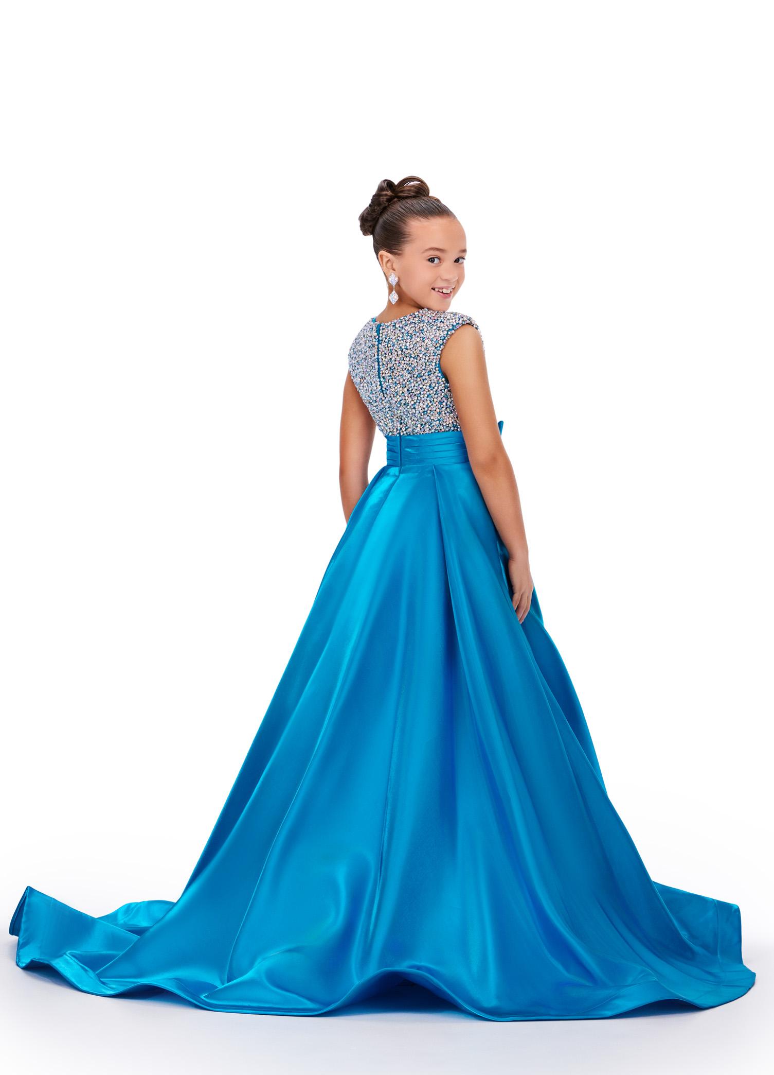 Back - Peacock ASHLEYlauren 8247 adorable kids ball gown featuring a fully embellished cap sleeve bodice, ruched waistline, and a full satin skirt accented with a bow for a charming and elegant look.