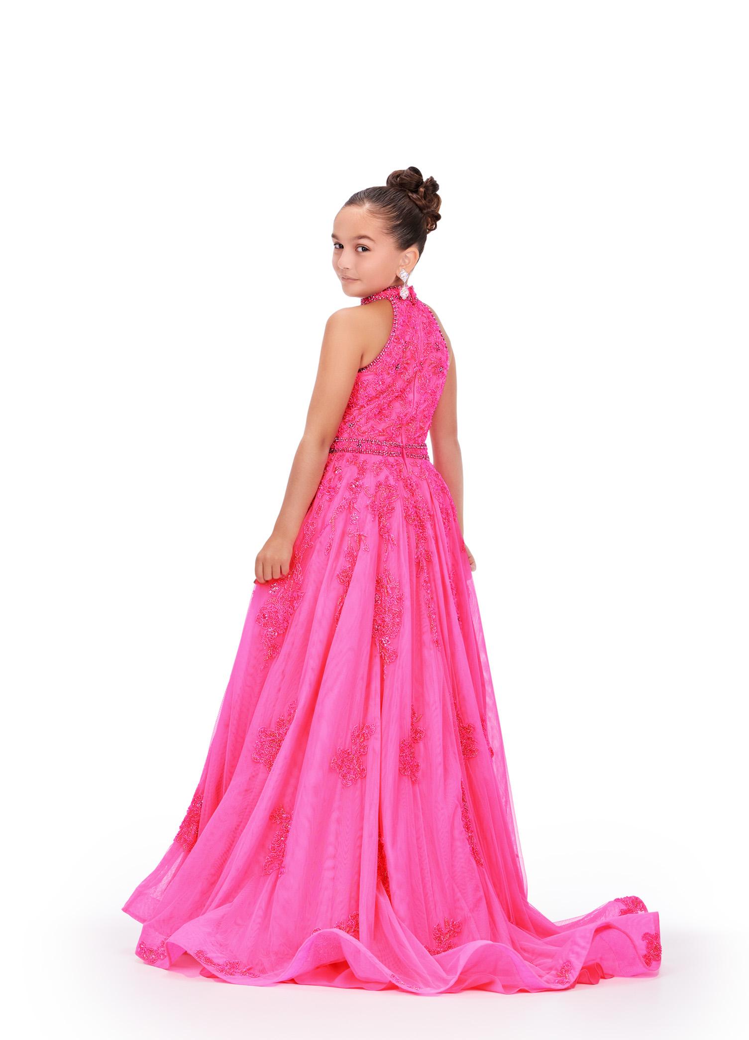 Back - Pink ASHLEYlauren 8238 kids ball gown featuring a halter neckline, ornately beaded bodice, crystal beaded waistline, and scattered beaded appliques cascading down the A-line skirt for a glamorous and elegant look.