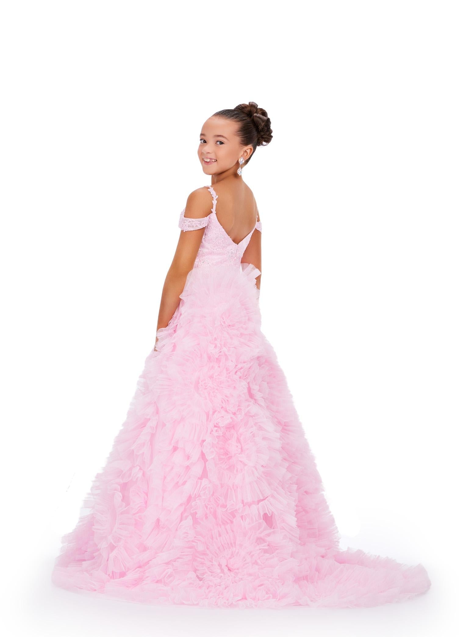 Back - Pink ASHLEYlauren 8246 elegant kids ball gown featuring a scoop neckline, draping off-shoulder straps, lace applique bodice adorned with scattered heat-set stones, and a dramatic A-line tulle ruffle skirt for a sophisticated and show-stopping look.