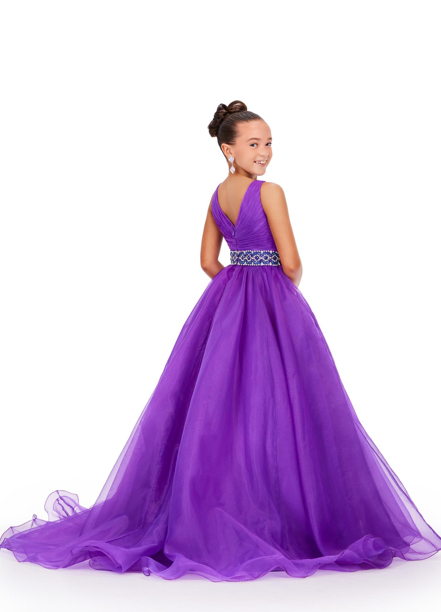 Back - Purple ASHLEYlauren 8249 kids ball gown featuring a V-neckline, ruched bodice, crystal beaded waistline, and a full organza A-line skirt for a graceful and elegant look.