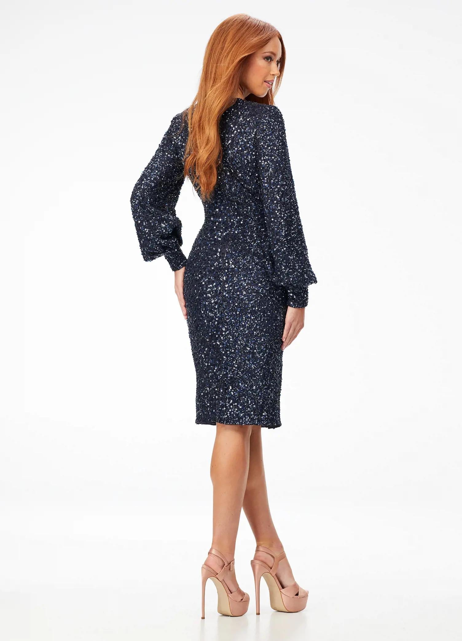 Back - Twilight ASHLEYlauren 4496 elegant fully sequin gown featuring a crew neckline, bishop sleeves, fitted tea-length skirt, and full zipper back for a sophisticated and timeless look.