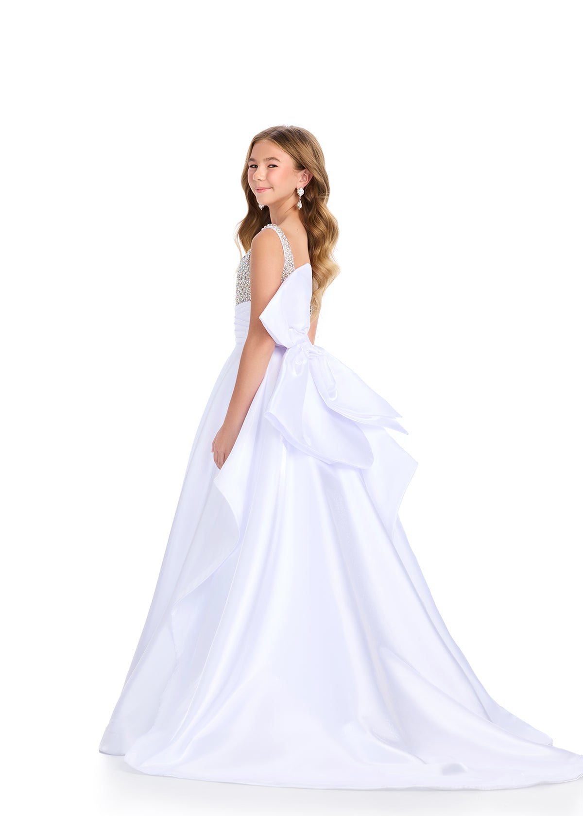 White ASHLEYlauren 8278 charming satin kids ball gown featuring a fully beaded bustier, an oversized bow detail, and a sweep train for a glamorous and statement-making look.