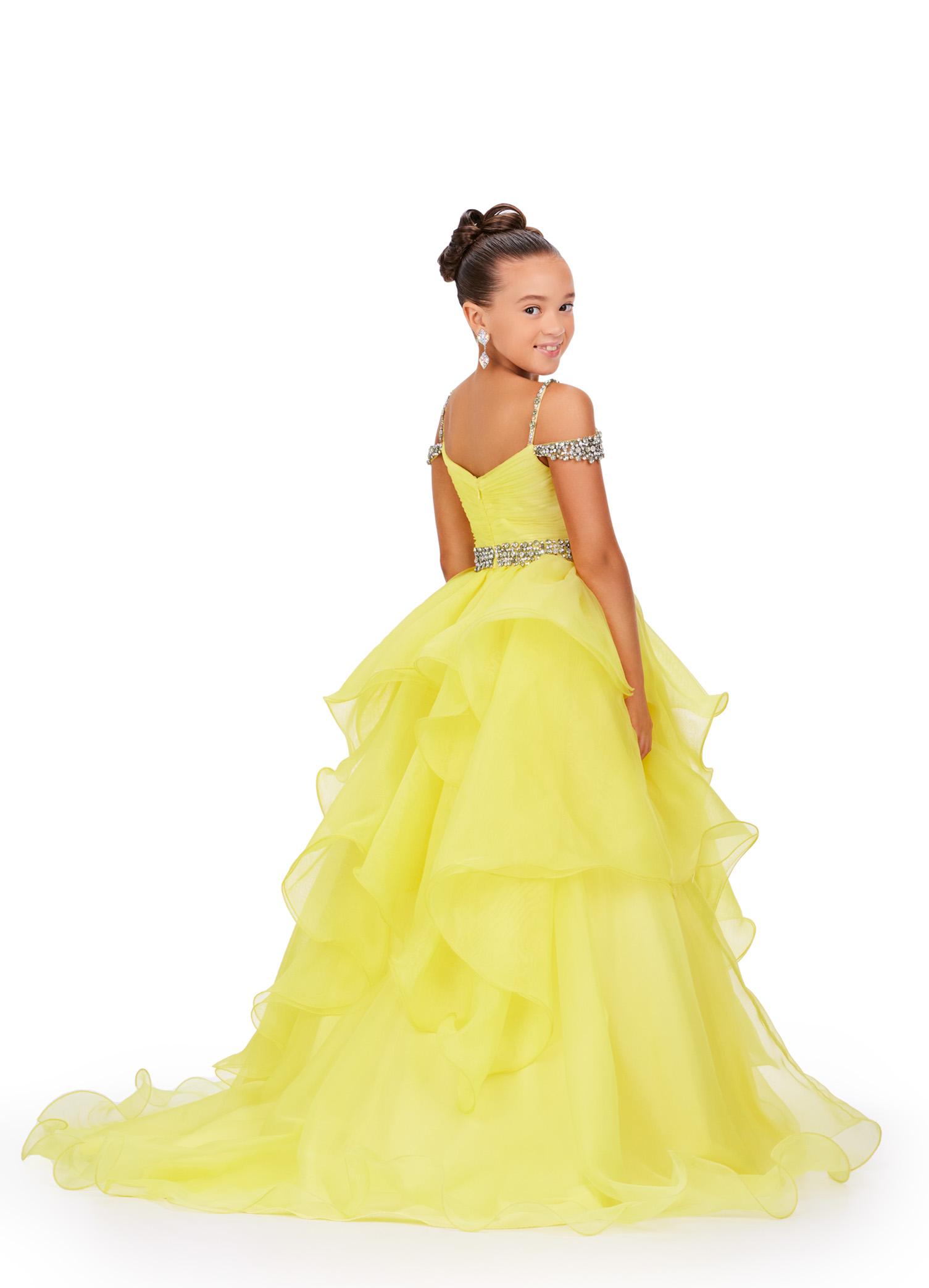 Back - Yellow ASHLEYlauren 8250 dreamy kids ball gown featuring an off-shoulder design, crystal-encrusted straps, ruched bodice, beaded waistline, and a dramatic ruffle organza skirt for a fairytale-inspired look.