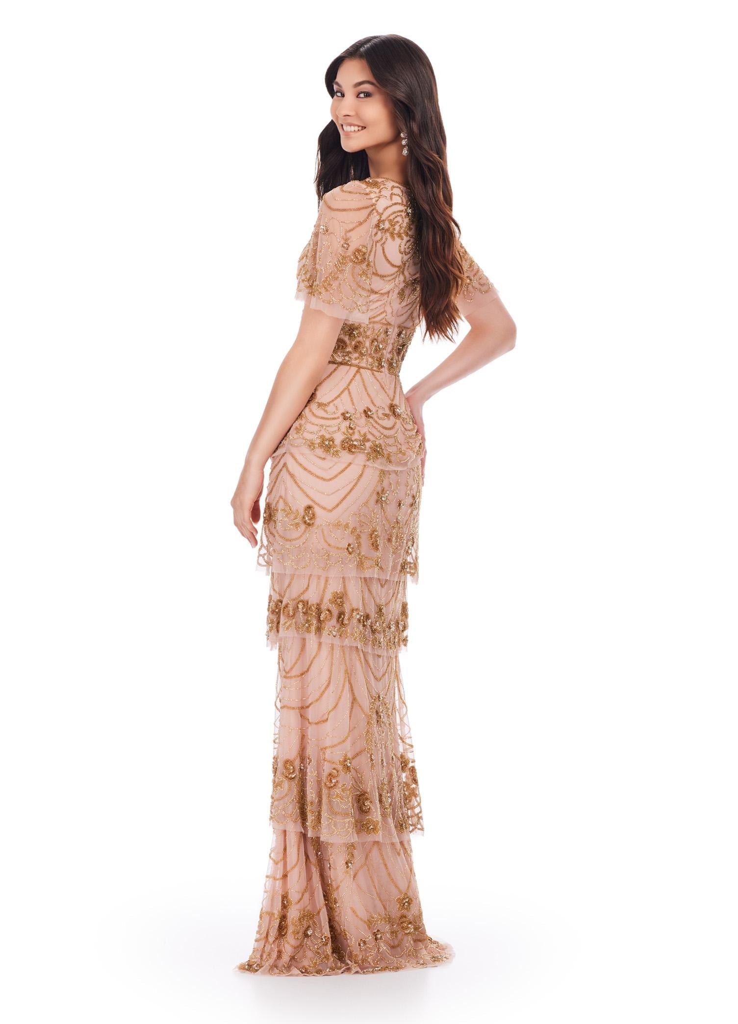 Back view. Gold/Rose Gold ASHLEYlauren 11235 Elegant Sequin Gown with V-Neckline, Flutter Butterfly Sleeves, Wide Waistband, Floral Beaded Bustier, and Multi-Tiered Skirt