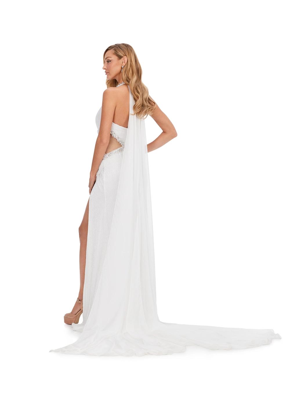 Back view. Ivory ASHLEYlauren 11399 stunning gown featuring a halter neckline, intricate liquid beading, crystal-accented illusion cut outs, and a dramatic chiffon cape for a glamorous and show-stopping look.