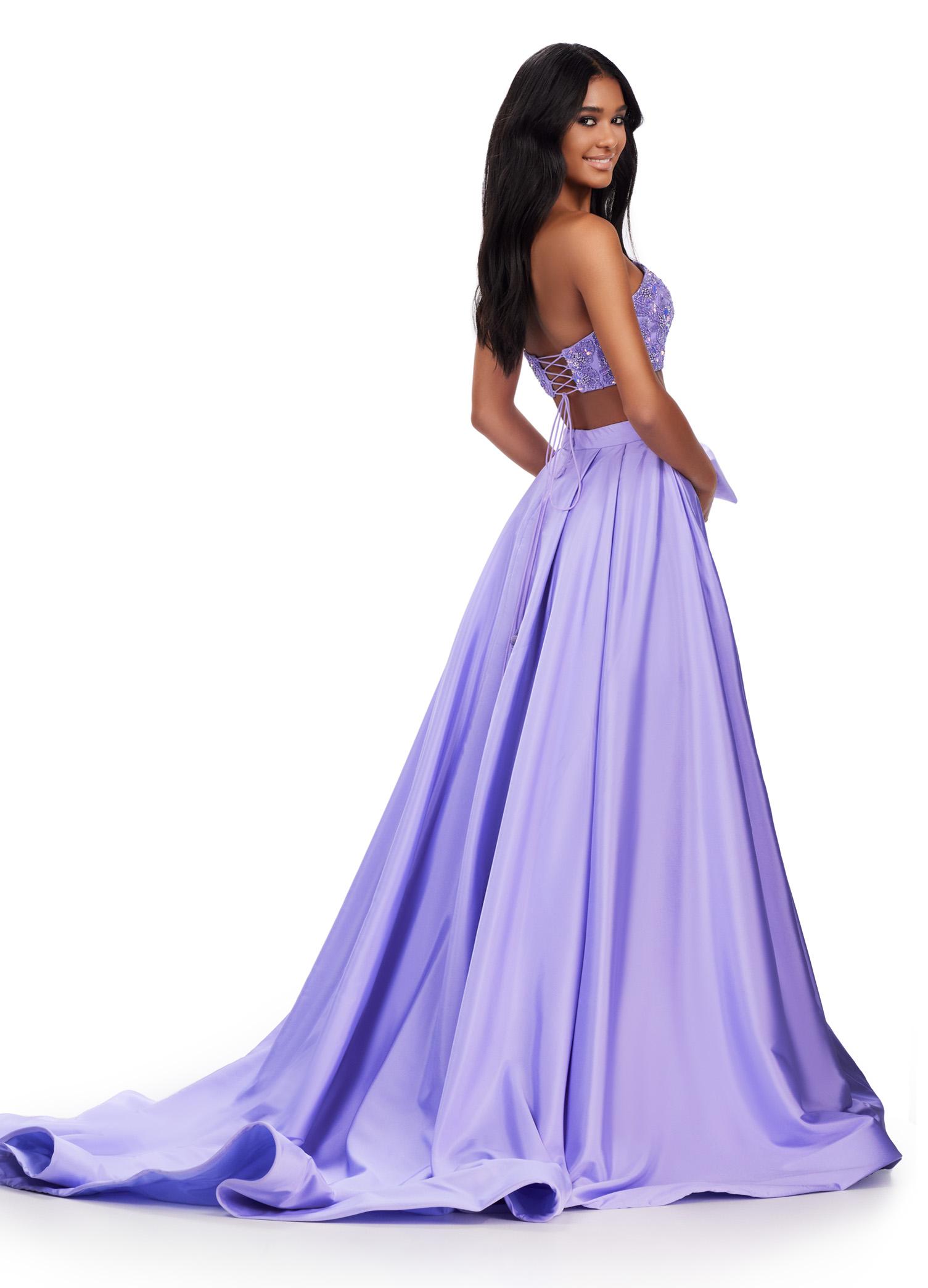 Back view. Lilac ASHLEYlauren 11650 Two-Piece Ball Gown with Intricately Beaded Strapless Bustier, A-Line Taffeta Skirt, and Statement Oversized Bow Detail