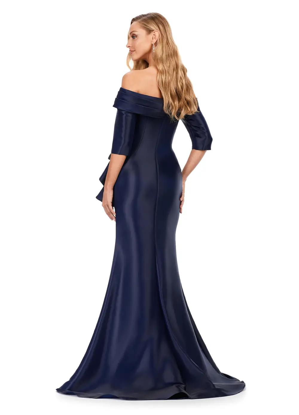 Back view. Navy ASHLEYlauren 11324 Elegant Off Shoulder Fitted Mermaid Gown in Phantom Satin with Statement Ruffle Detail at the Hip