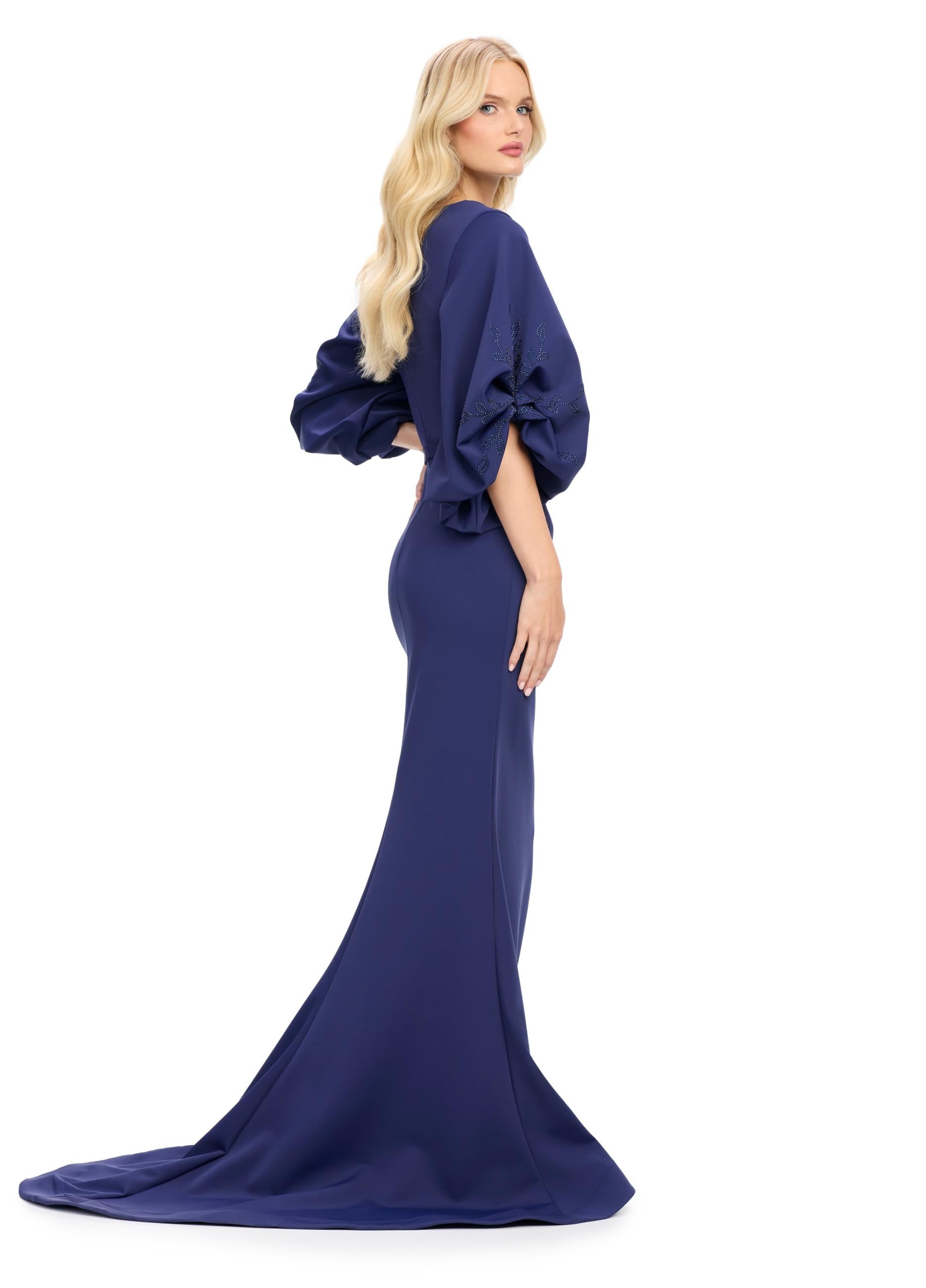 Back view. Navy ASHLEYlauren 11740 Timeless Fitted Scuba Gown with Elegant V-Neckline, Embellished Balloon Sleeves, Press On Stone Accents, and Wrap Skirt Design