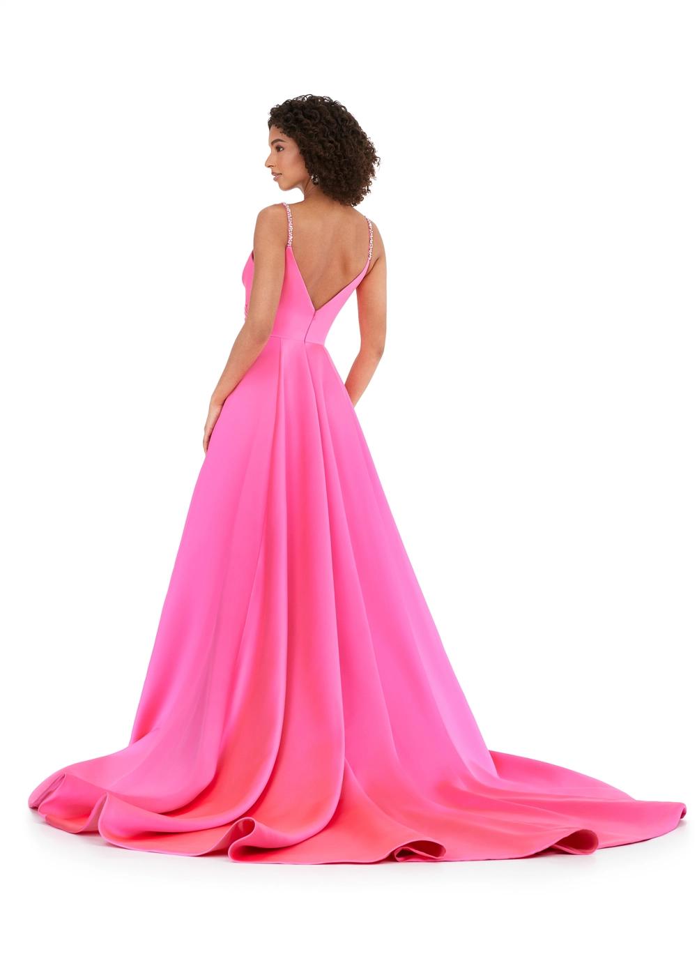 Back view. Pink ASHLEYlauren 11267 stunning A-line gown featuring delicate spaghetti straps, a sweetheart neckline, eye-catching crystal trim, and asymmetrical ruching on the bustier to accentuate your curves for a glamorous and sophisticated look.