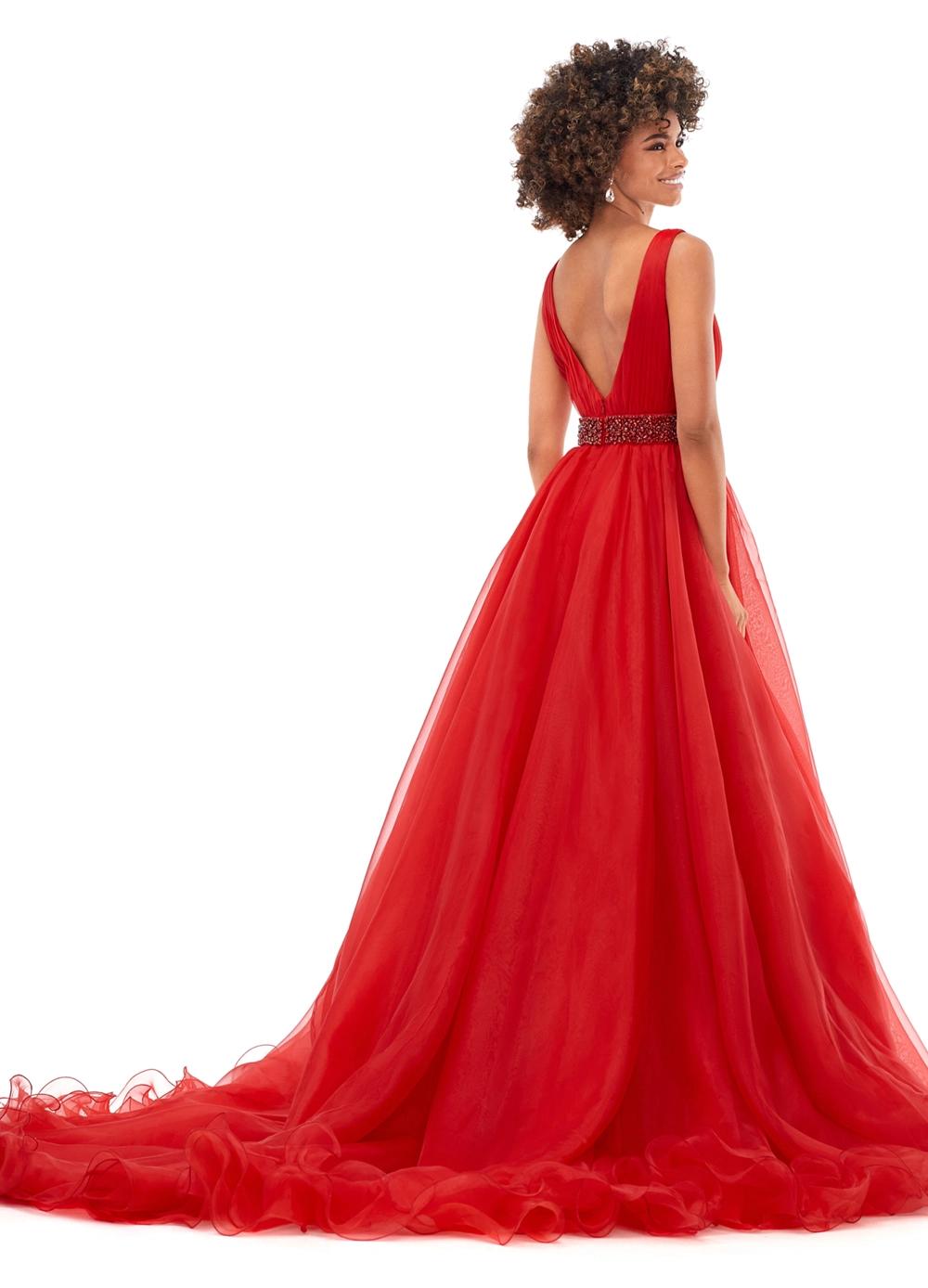Back view. Red ASHLEYlauren 11305 stunning organza ball gown featuring a deep V-neckline, V-back, crystal-encrusted waistband, and a long, lavish train for an elegant and show-stopping look.