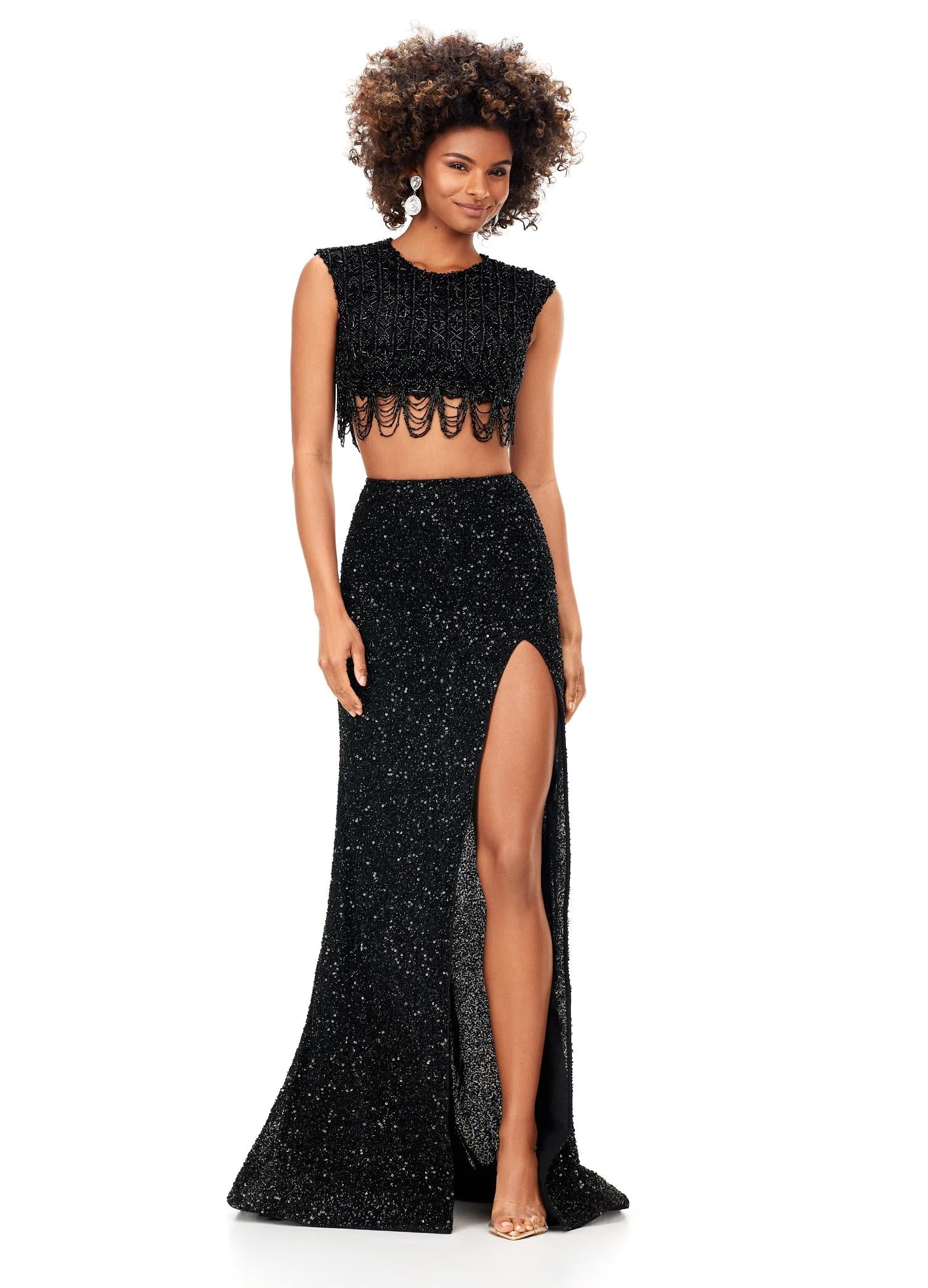 Black ASHLEYlauren 11282 glamorous two-piece fully sequin gown featuring a crew neckline, cap sleeves, intricate bead pattern draping from the bustier, and a fitted skirt with a left leg slit for a vintage-inspired, show-stopping look.