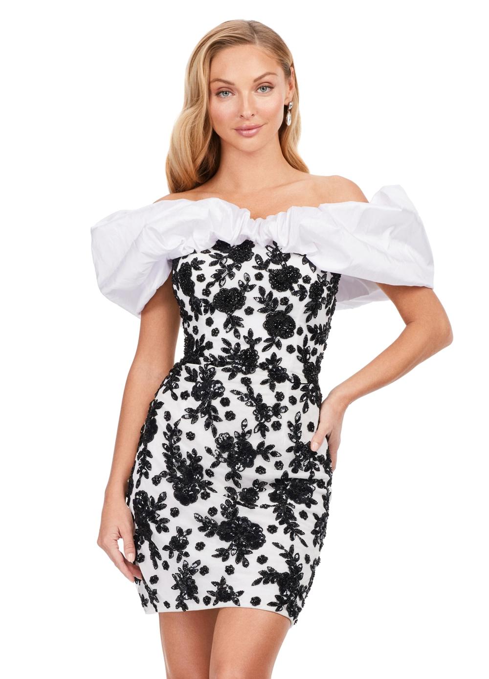 Black/White  ASHLEYlauren 4613 fully beaded cocktail dress featuring an off shoulder neckline with oversized taffeta ruffle detail and a fitted skirt for a bold and fun statement look.