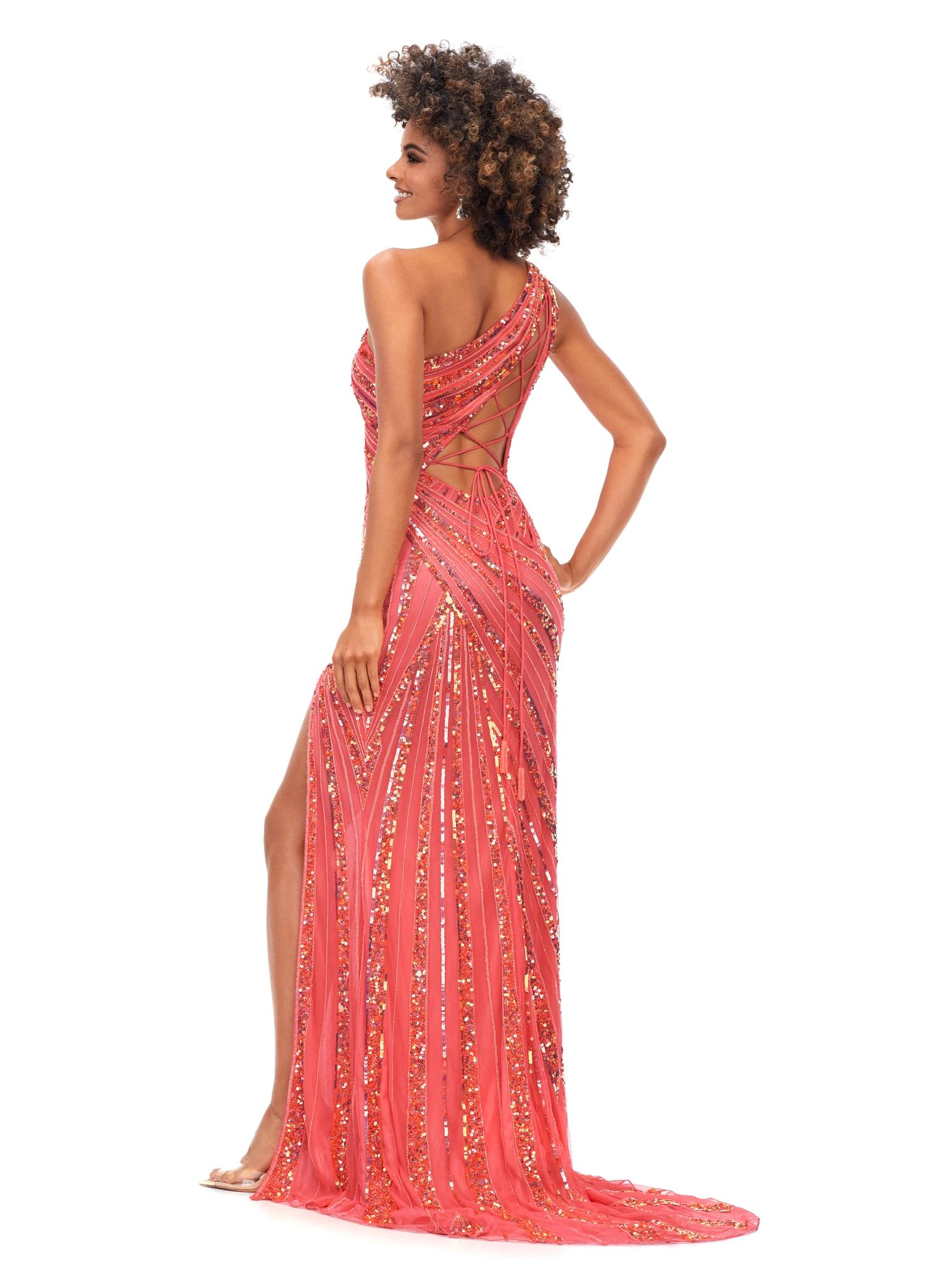 Back - Coral ASHLEYlauren 11244 – A stunning one-shoulder gown featuring intricate beadwork that accentuates your curves, a left leg slit, and a signature asymmetrical lace-up back. Perfect for making a show-stopping statement at any event.