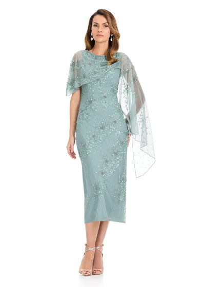 ASHLEYlauren E12141 Gown | Sage beaded gown featuring a sleek column silhouette, soft boat neckline, and dramatic cape sleeve for a sophisticated, polished appearance.