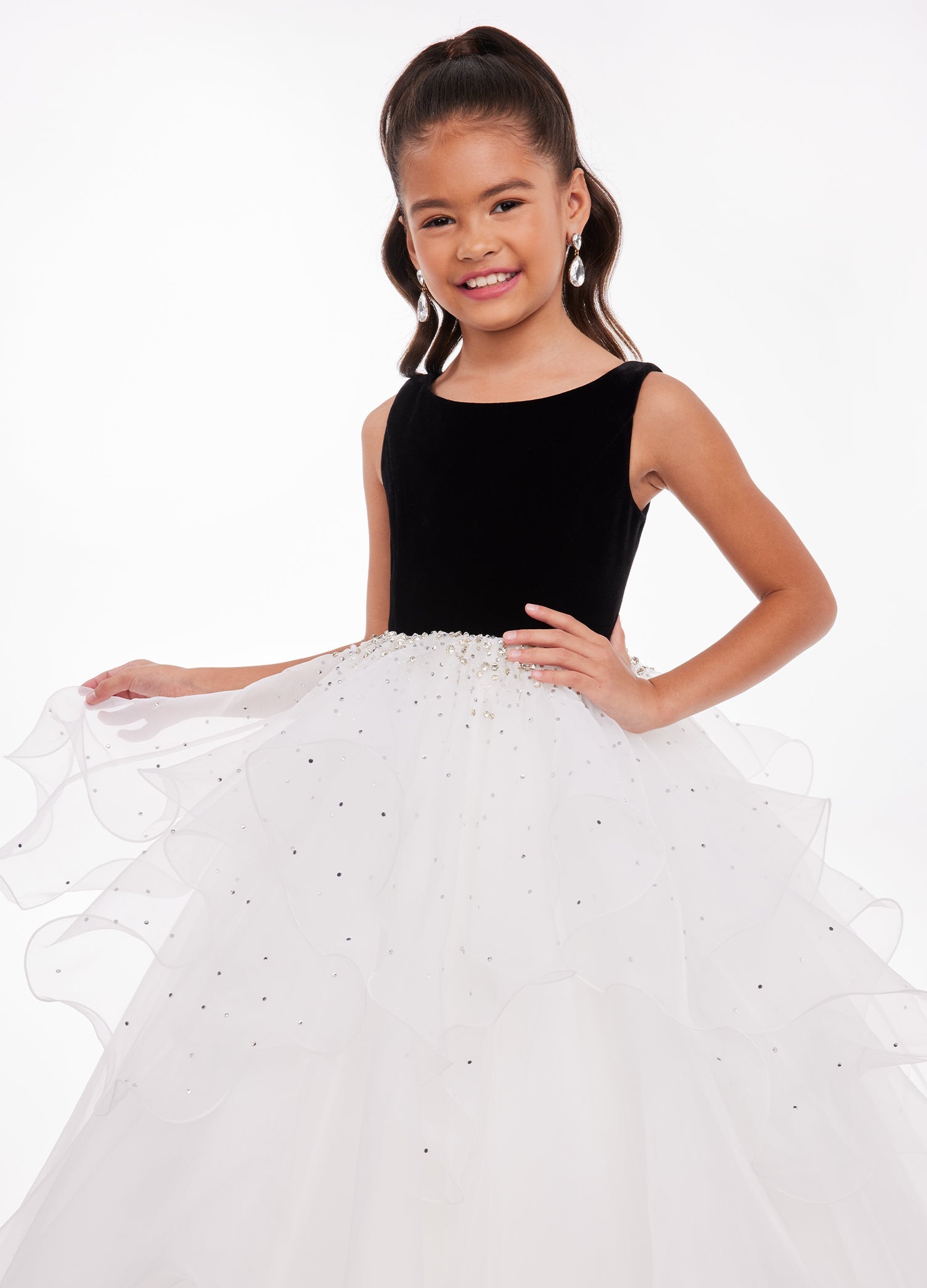 Front. Black/Ivory ASHLEYlauren Kids 8120 elegant ball gown featuring a crew neckline, velvet bustier, beaded waistline, and cascading press-on stone details over a handkerchief organza skirt for a sophisticated and graceful look.