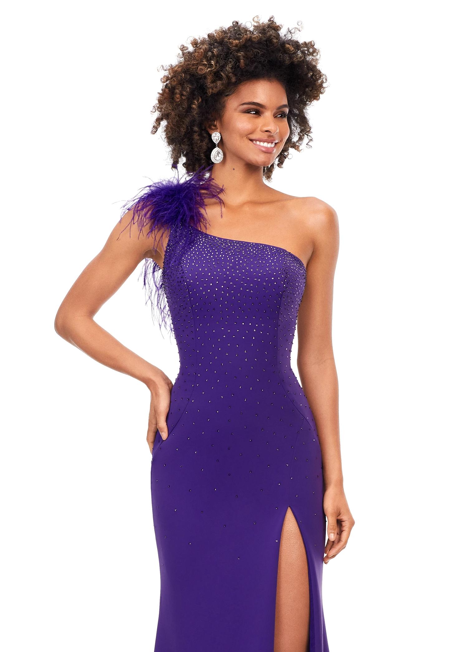 ASHLEYlauren 11290 | Orchid scuba gown featuring feather-embellished neckline, heat set stones cascading down the skirt, and a left leg slit for a bold and elegant look.