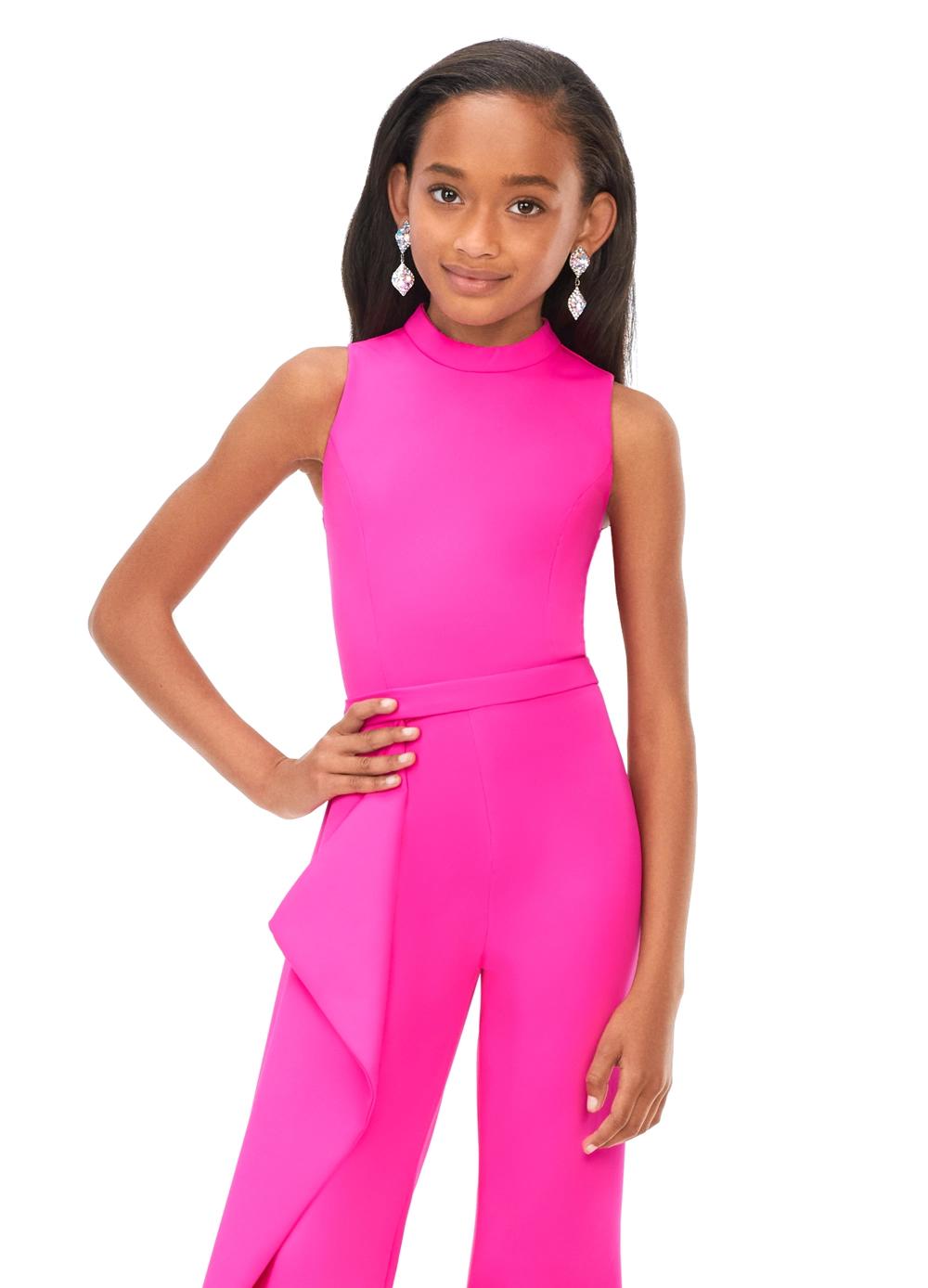 Front. Pink ASHLEYlauren Kids 8158 fun and stylish scuba jumpsuit featuring a high crew neckline, dramatic cascading ruffle accent down the leg, and flare pants for a bold and fabulous look.