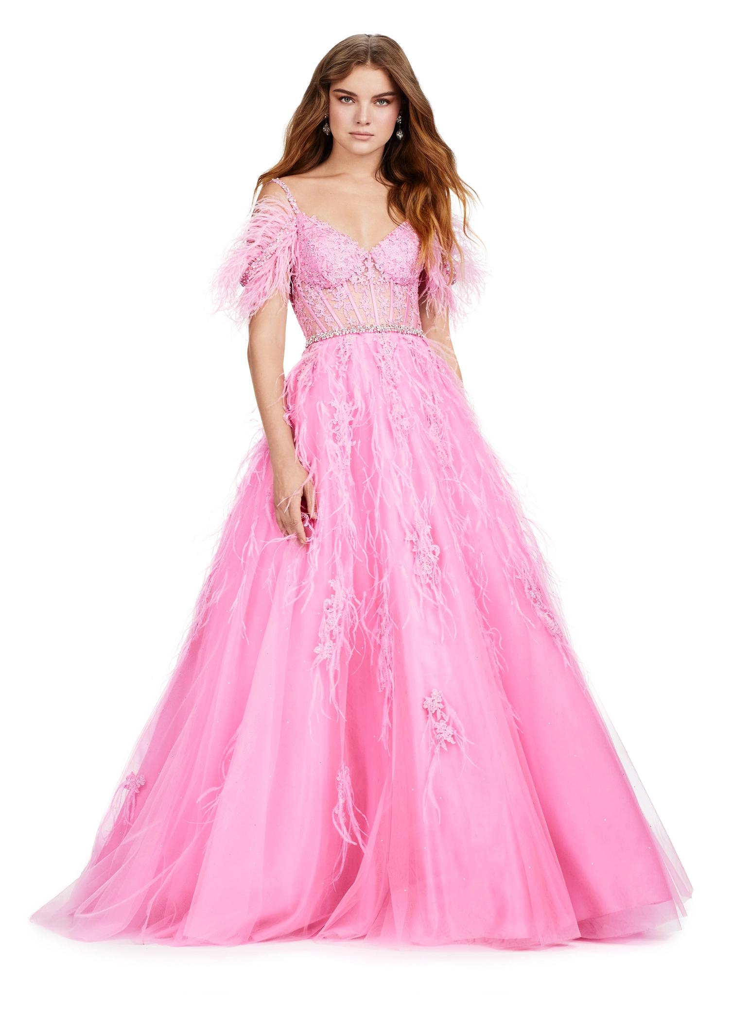 Front view. ASHLEYlauren 11447 pink A-line gown with beaded corset bustier, feather off shoulder straps, exposed boning, and lace appliqué
