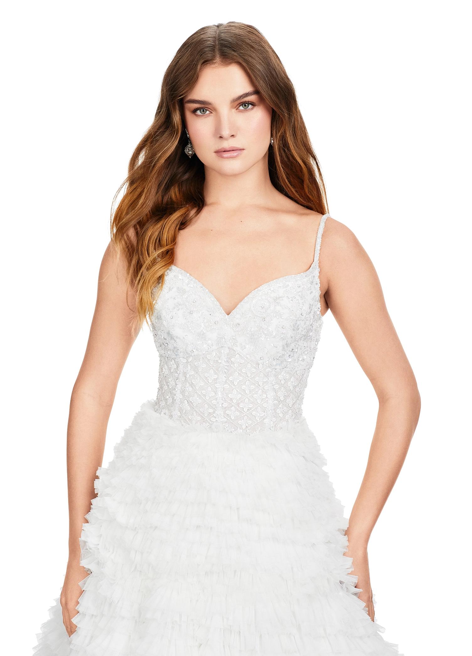 Front view. Ivory ASHLEYlauren 11427 breathtaking ball gown featuring a fully beaded bustier, sweetheart neckline, and a voluminous tiered tulle skirt for an enchanting and regal look.