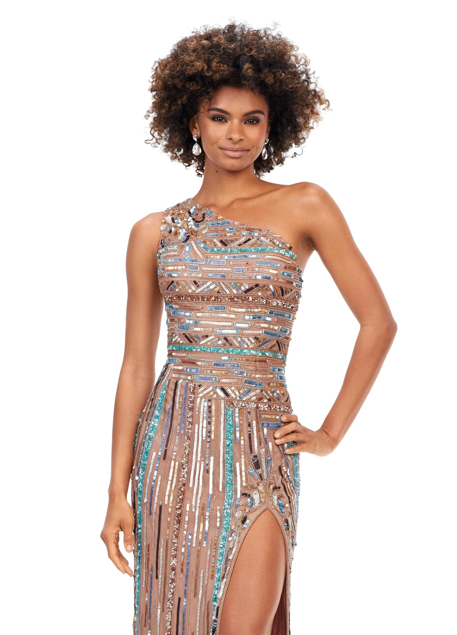Front view. Multi ASHLEYlauren 11372 striking one shoulder gown featuring an intricate Aztec-inspired hand-beaded design with vibrant turquoise accents, an open back, and a left leg slit for a bold and show-stopping statement look.