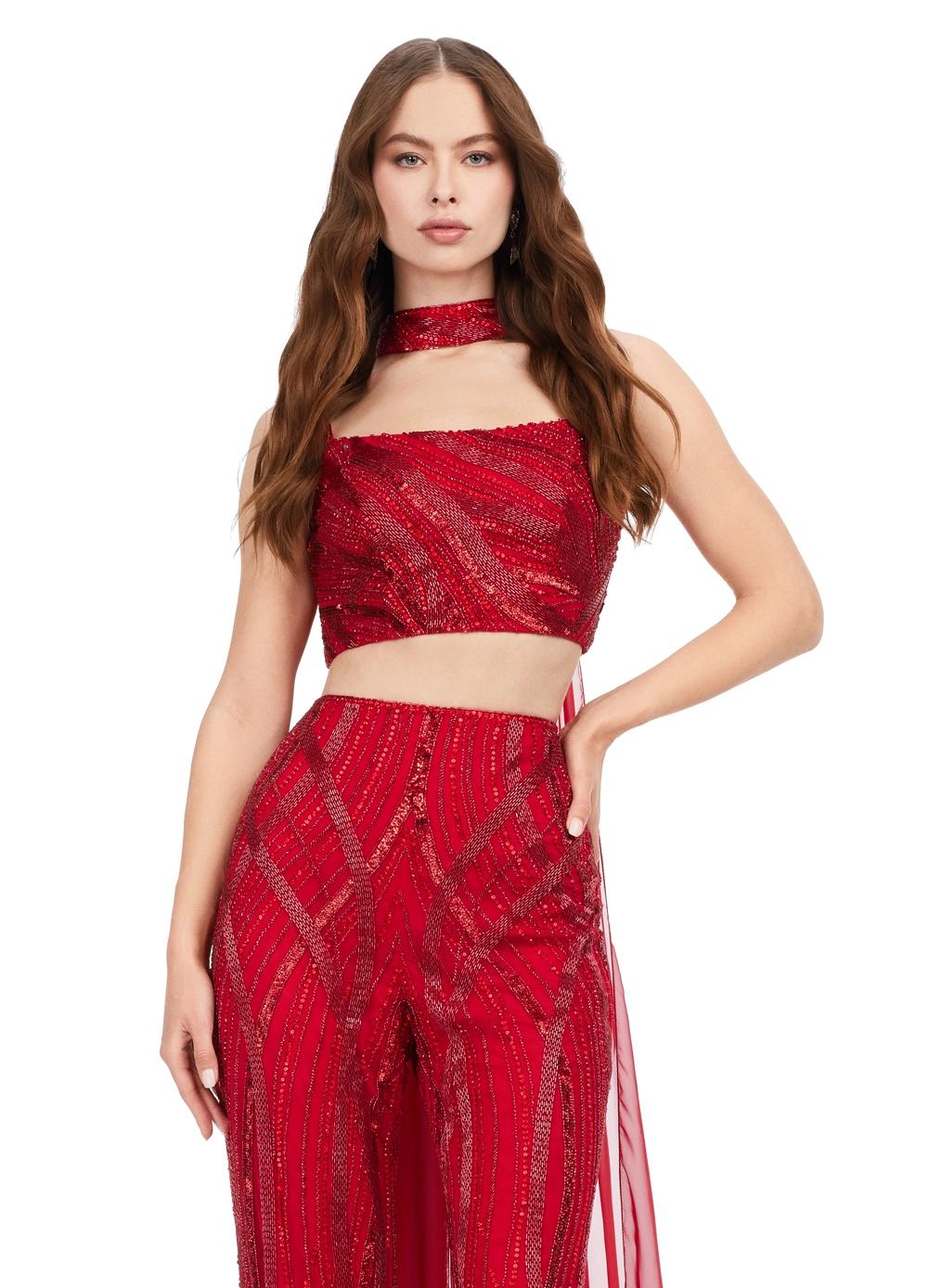 Front view. Red ASHLEYlauren 11385 statement two-piece jumpsuit featuring an intricately hand-beaded bustier and pants, a matching beaded choker, and a dramatic chiffon cape for a bold and fashion-forward look.