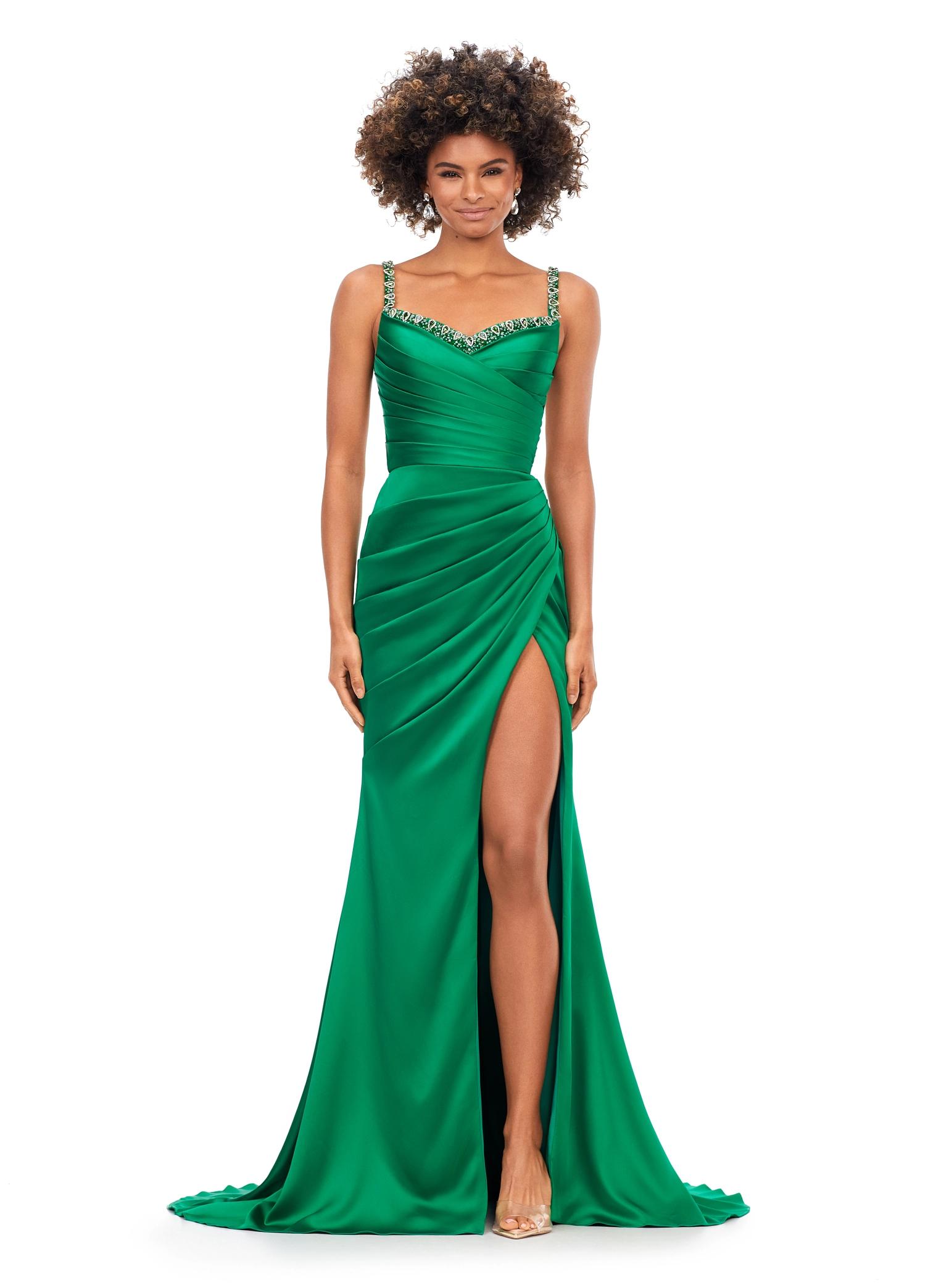 Green ASHLEYlauren 11298 satin gown featuring a modified sweetheart neckline with crystal trim, ruched bodice, wrap skirt with left leg slit, and lace-up back.