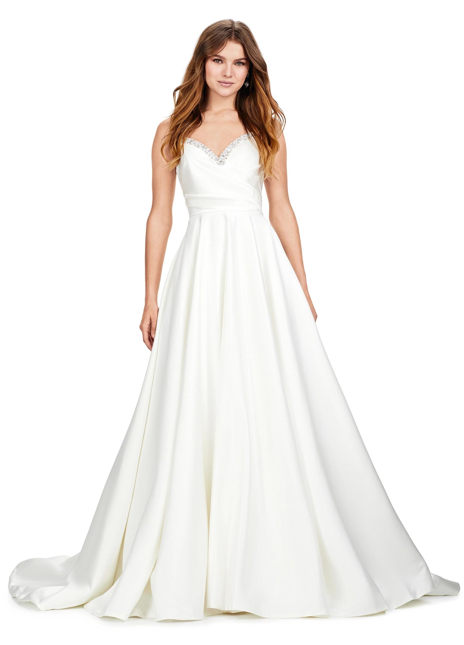 Ivory ASHLEYlauren 11267 stunning A-line gown featuring delicate spaghetti straps, a sweetheart neckline, eye-catching crystal trim, and asymmetrical ruching on the bustier to accentuate your curves for a glamorous and sophisticated look.