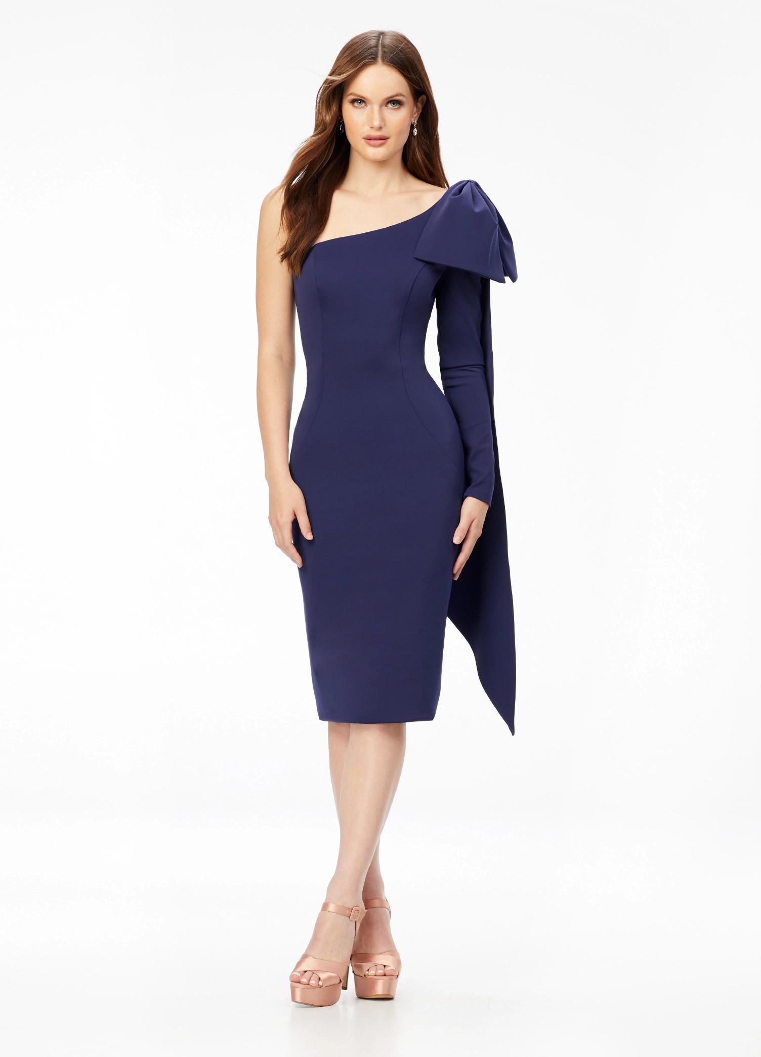 Navy ASHLEYlauren 4480 one shoulder scuba cocktail dress featuring a single sleeve, elegant bow detail, and trailing bow tails for a sophisticated and stylish finish.