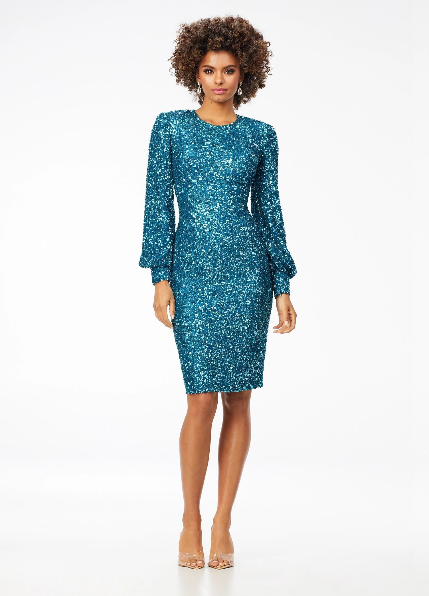 Peacock ASHLEYlauren 4496 elegant fully sequin gown featuring a crew neckline, bishop sleeves, fitted tea-length skirt, and full zipper back for a sophisticated and timeless look.