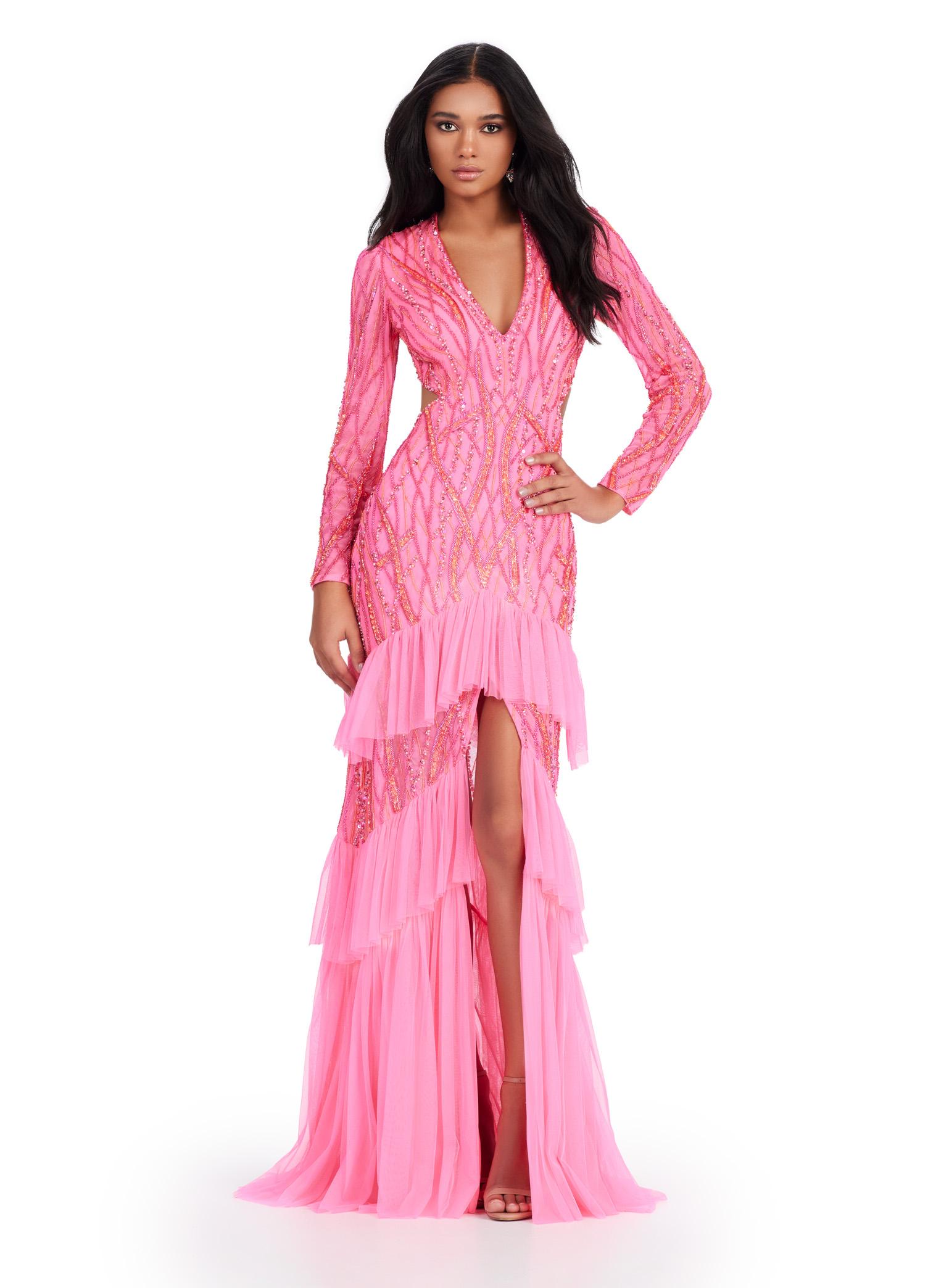 Pink ASHLEYlauren 11436 stunning fully beaded gown featuring a V-neckline, open back, long sleeves, and a tiered ruffle skirt with a center slit for a show-stopping entrance.