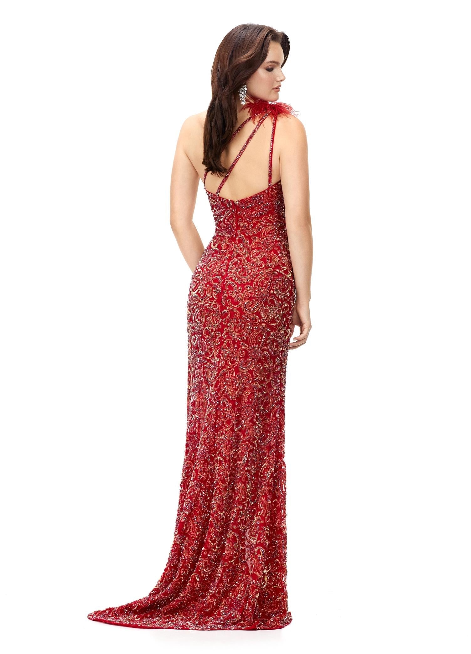 Back - Red ASHLEYlauren 11277 one shoulder gown featuring intricate sequin and crystal beading, feather-accented neckline, left leg slit, and strappy open back.