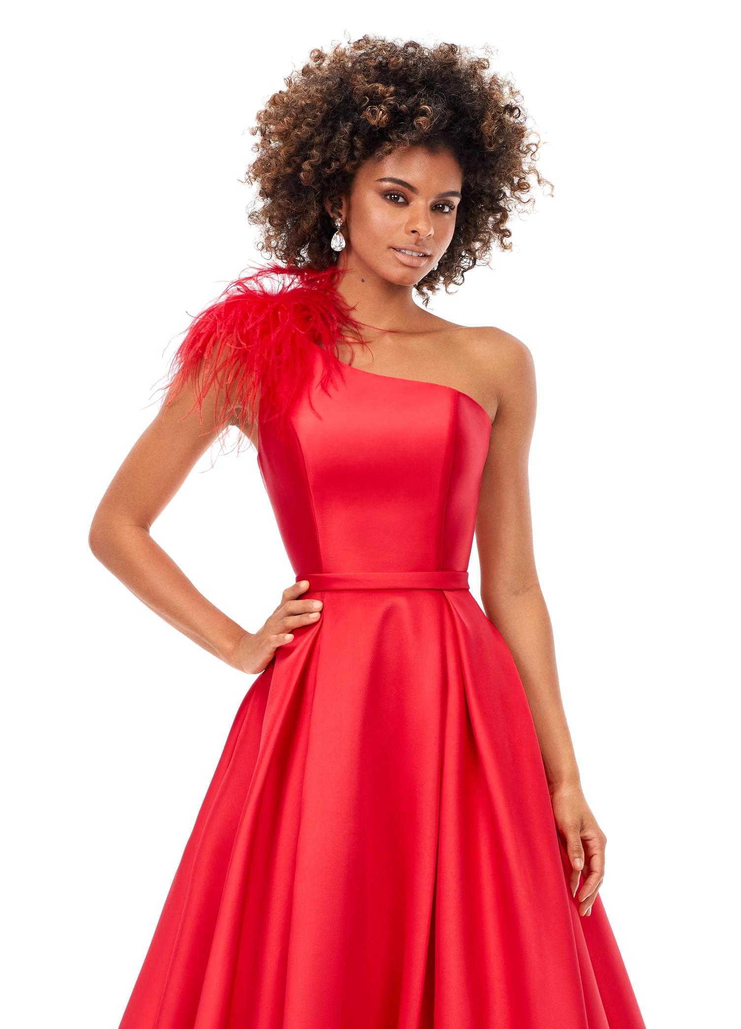Red ASHLEYlauren 11336 one shoulder ball gown in Mikado fabric, featuring feather-embellished neckline and a classic A-line skirt.