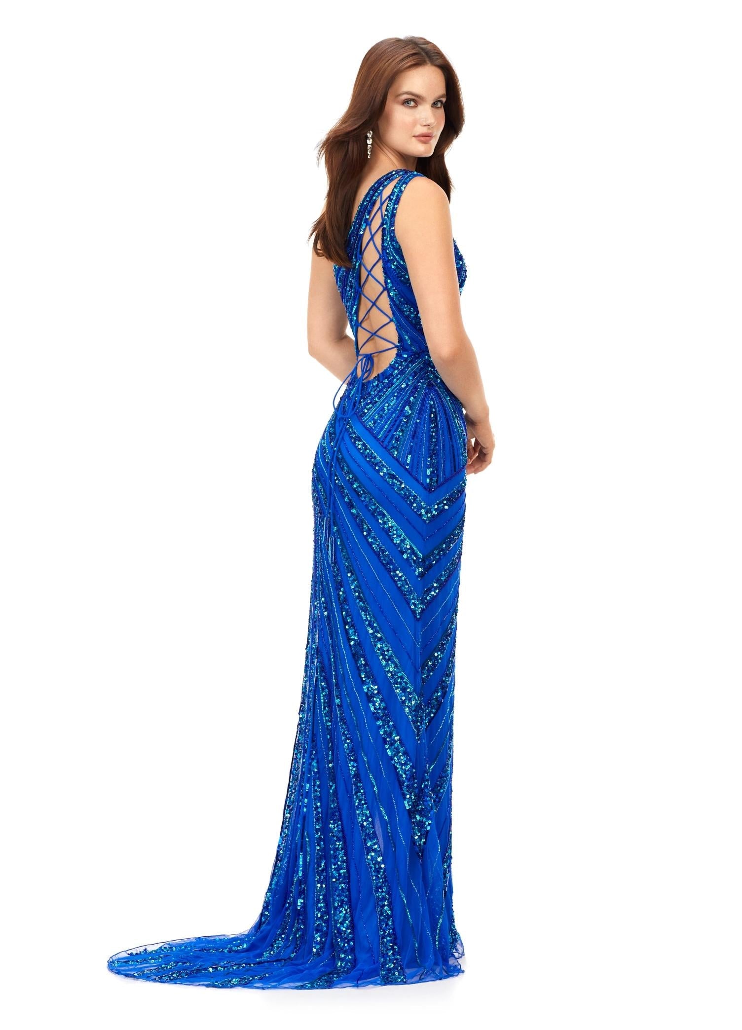 Back - Royal ASHLEYlauren 11244 – A stunning one-shoulder gown featuring intricate beadwork that accentuates your curves, a left leg slit, and a signature asymmetrical lace-up back. Perfect for making a show-stopping statement at any event.