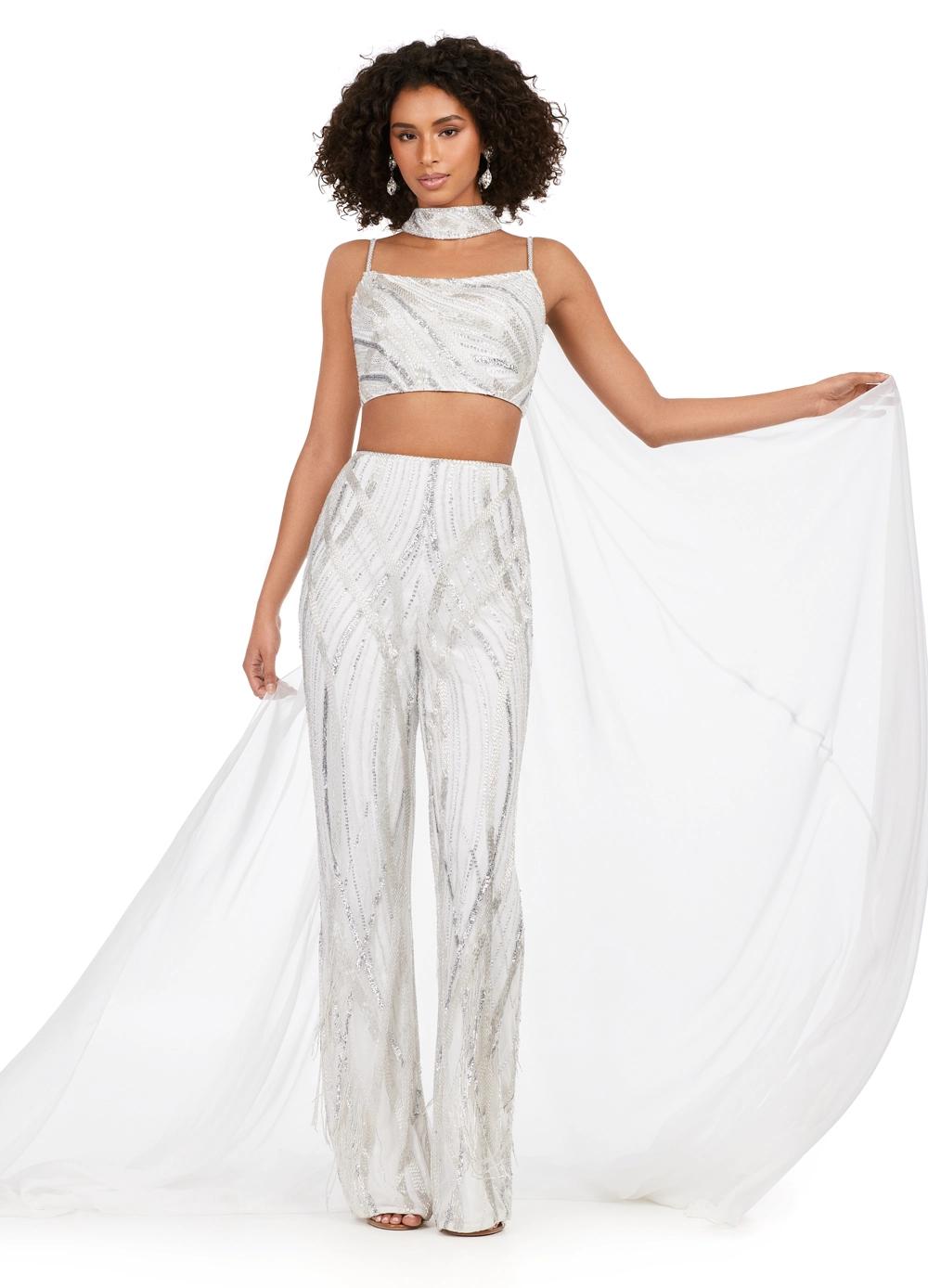 Silver ASHLEYlauren 11385 statement two-piece jumpsuit featuring an intricately hand-beaded bustier and pants, a matching beaded choker, and a dramatic chiffon cape for a bold and fashion-forward look.