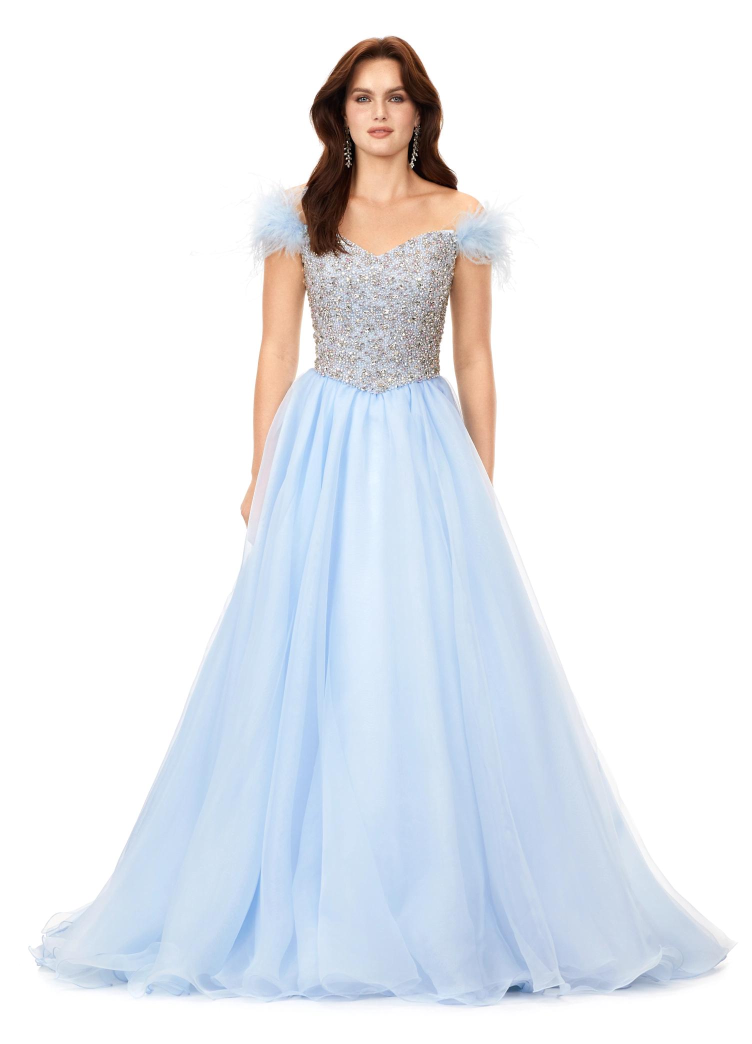 Sky ASHLEYlauren 11314 off shoulder gown featuring feather straps, a crystal-encrusted bustier, and a flowing organza A-line skirt with wire hem.