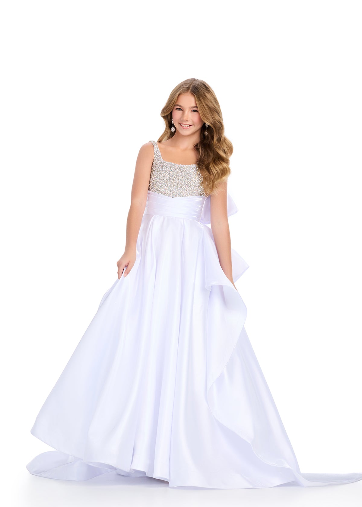 White ASHLEYlauren 8278 charming satin kids ball gown featuring a fully beaded bustier, an oversized bow detail, and a sweep train for a glamorous and statement-making look.