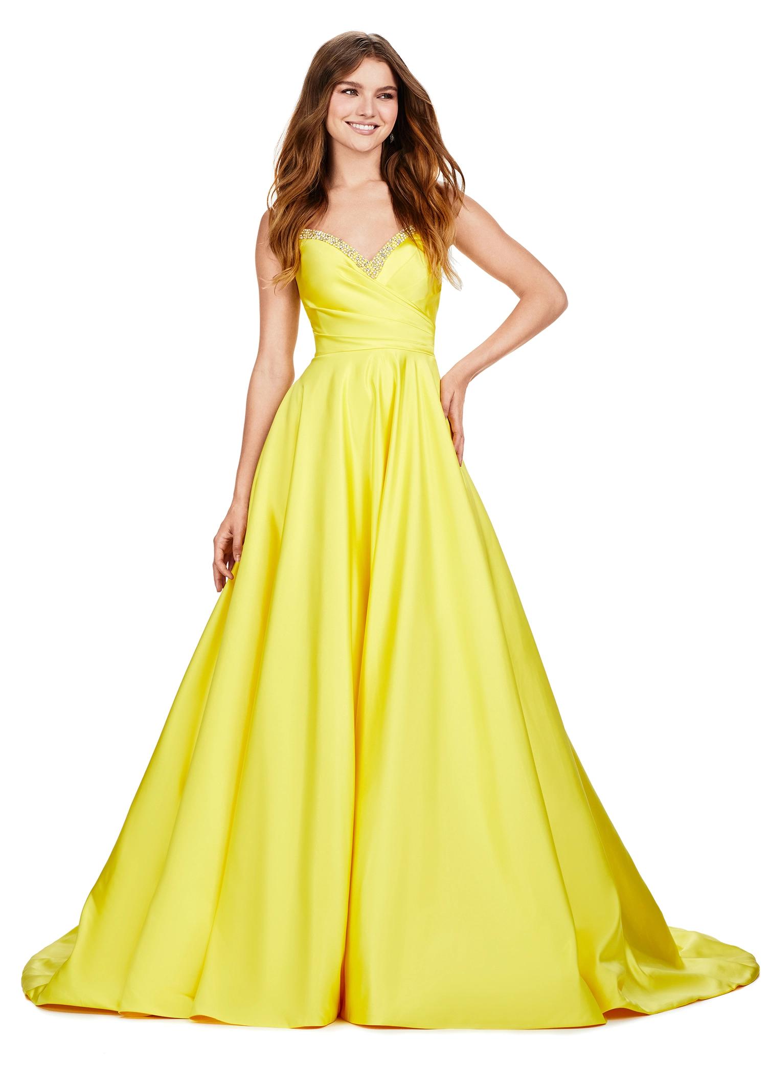 Yellow ASHLEYlauren 11267 stunning A-line gown featuring delicate spaghetti straps, a sweetheart neckline, eye-catching crystal trim, and asymmetrical ruching on the bustier to accentuate your curves for a glamorous and sophisticated look.