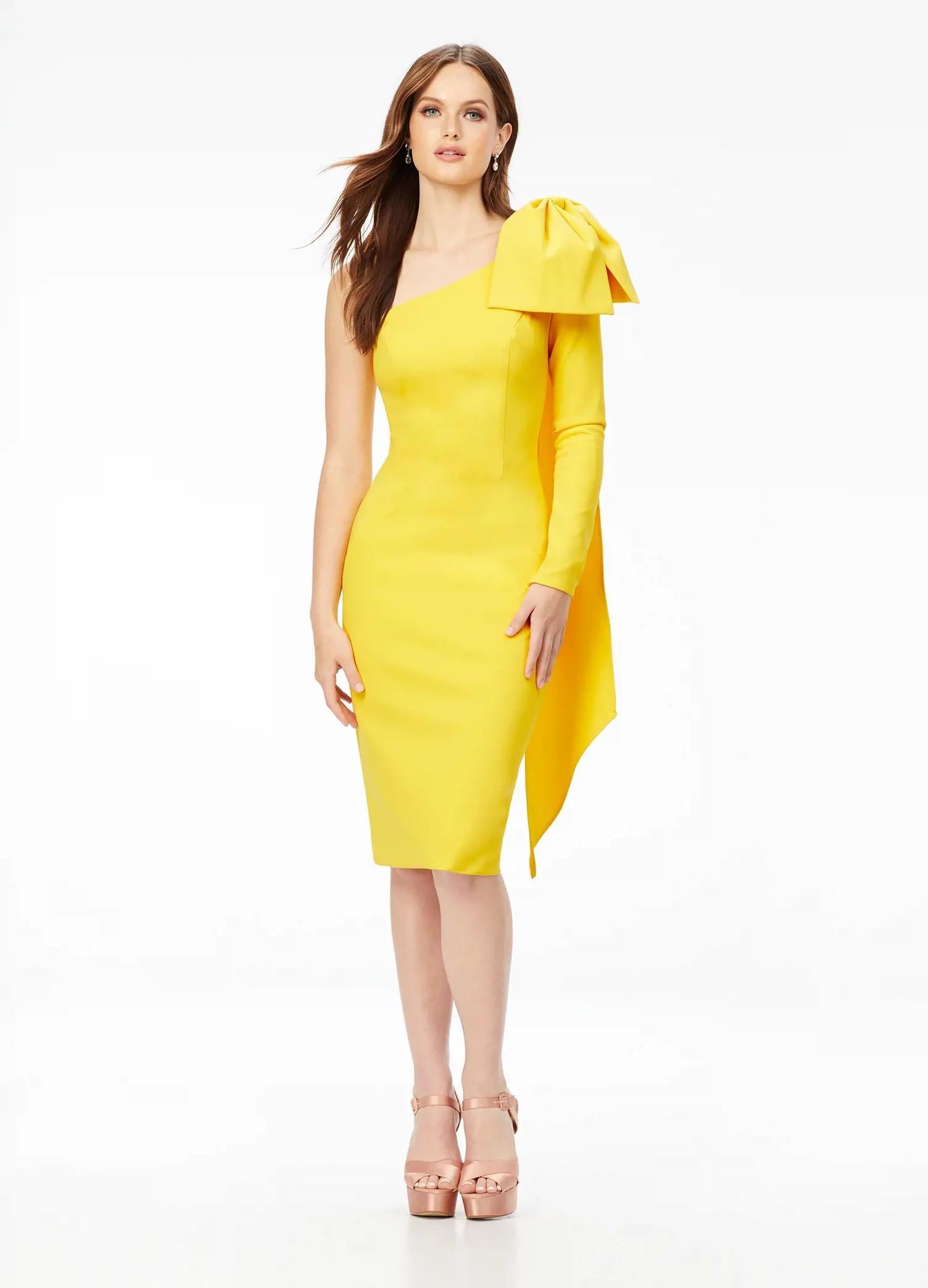 Yellow ASHLEYlauren 4480 one shoulder scuba cocktail dress featuring a single sleeve, elegant bow detail, and trailing bow tails for a sophisticated and stylish finish.