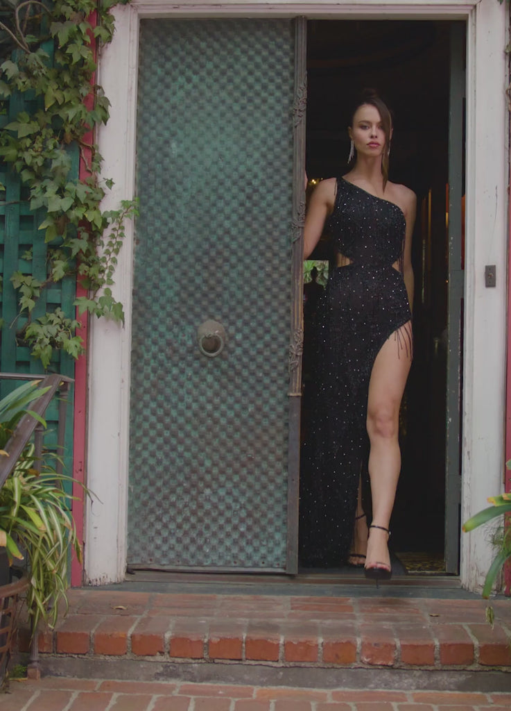 Video - ASHLEYlauren 11280 daring one shoulder gown featuring an intricate bead pattern, scattered fringe accents, bold side cut outs, and a left leg slit for a striking and glamorous statement look.