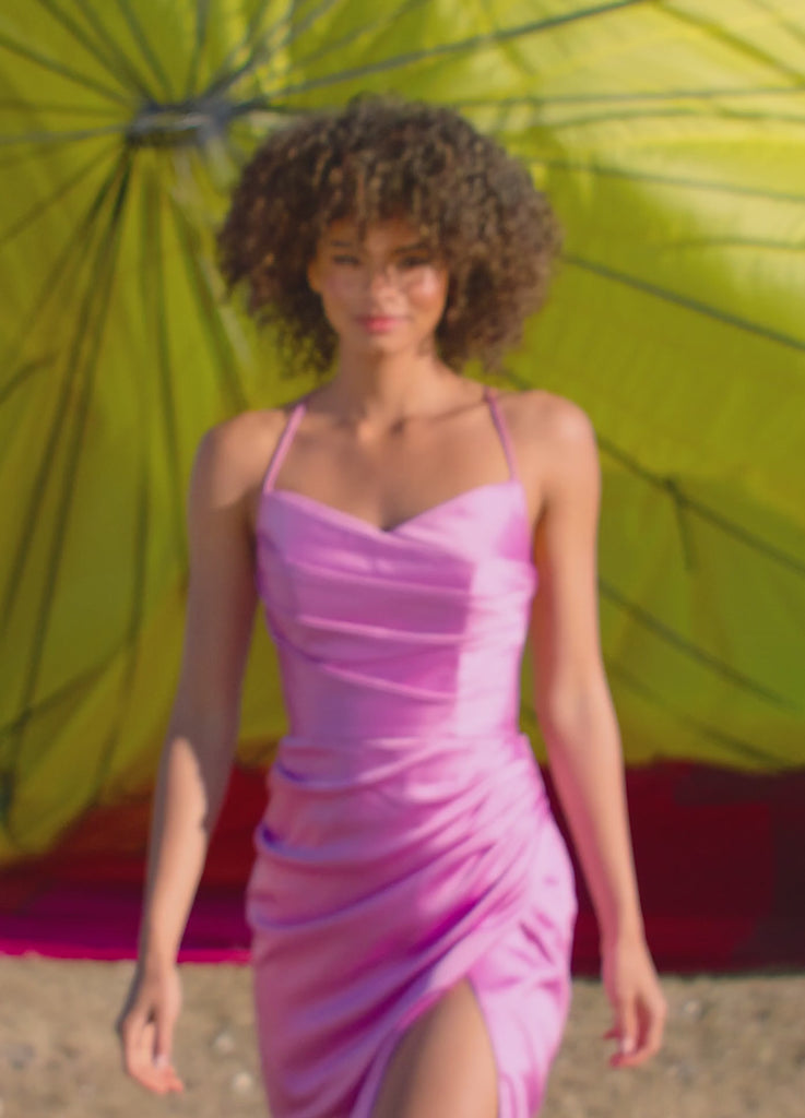 Video - ASHLEYlauren 4513 satin cocktail dress featuring spaghetti straps, an exquisitely draped bodice, wrap fitted skirt with a left leg slit, and an open lace-up back for an elegant and sophisticated look. 