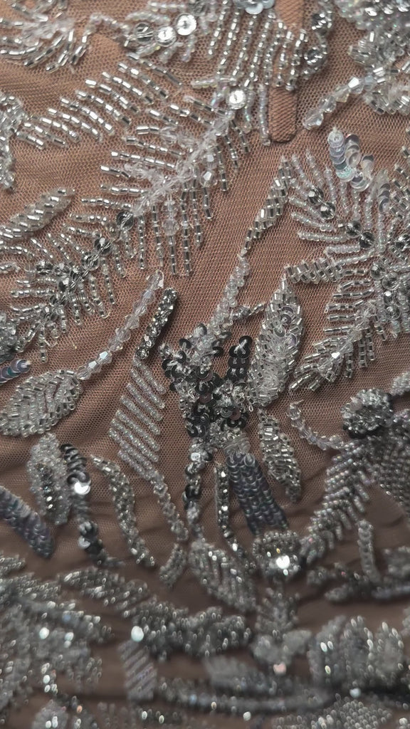 Video. ASHLEYlauren 4605 fully beaded cocktail dress featuring a sweetheart neckline, delicate spaghetti straps, a floral bead pattern, and a fitted skirt for a romantic and elegant look.