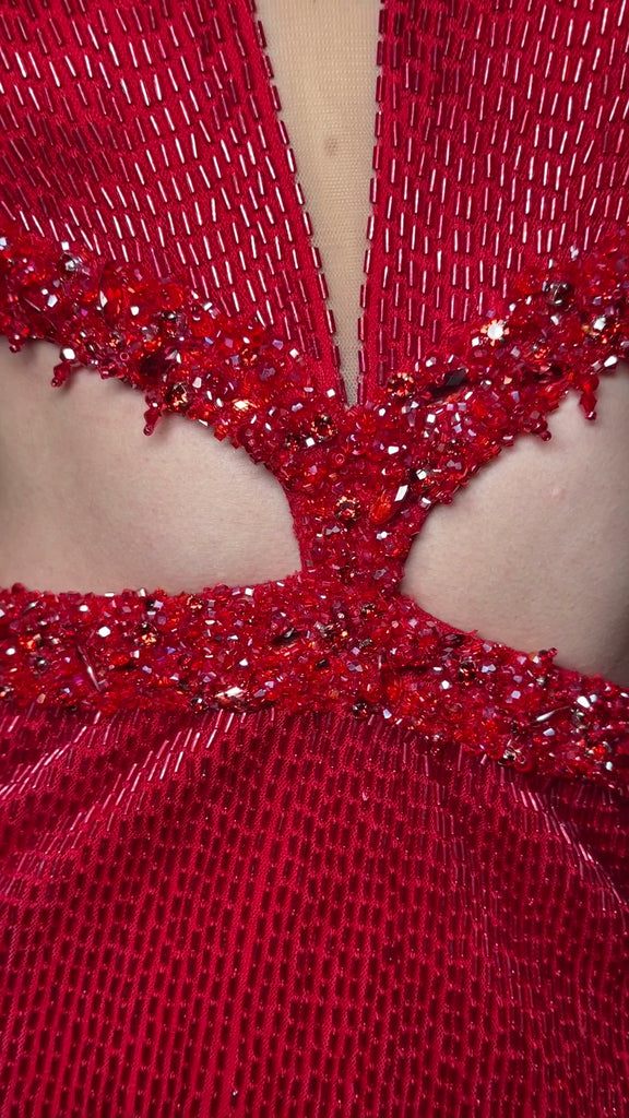 Video - Red ASHLEYlauren 4583 liquid beaded cocktail dress featuring a V-neckline, dramatic cut-outs, long sleeves, and a fitted silhouette for a bold and head-turning look.