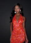 ASHLEYlauren 4953 | Orange fully beaded mini dress with plunging halter neckline, fitted silhouette, and open back