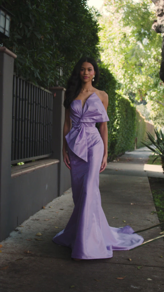 ASHLEYlauren 12279 | Orchid fitted mikado gown with oversized sculpted bodice detail, sleek mermaid silhouette, and dramatic sweep train