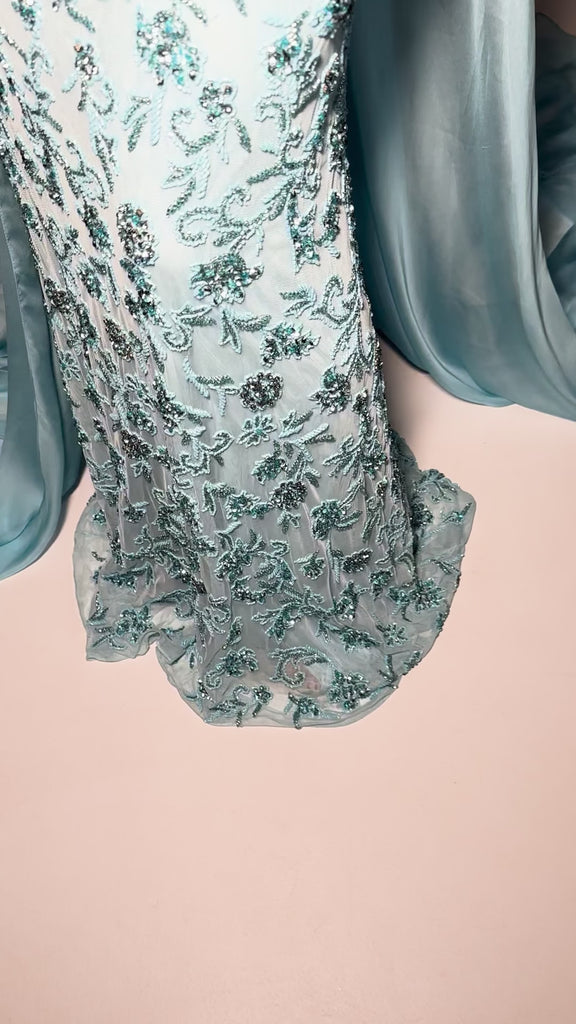 Video - ASHLEYlauren 11404 breathtaking strapless gown featuring intricate full sequin beading, a matching sequin choker, and a flowing chiffon cape for a dramatic and statement-making look.