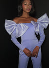 ASHLEYlauren 12090 | Periwinkle off-shoulder scuba jumpsuit with oversized organza bows, long sleeves, and flared leg silhouette
